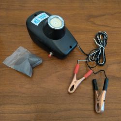 Nettoyeur pour bougie d'allumage fonctionne en 12 volts