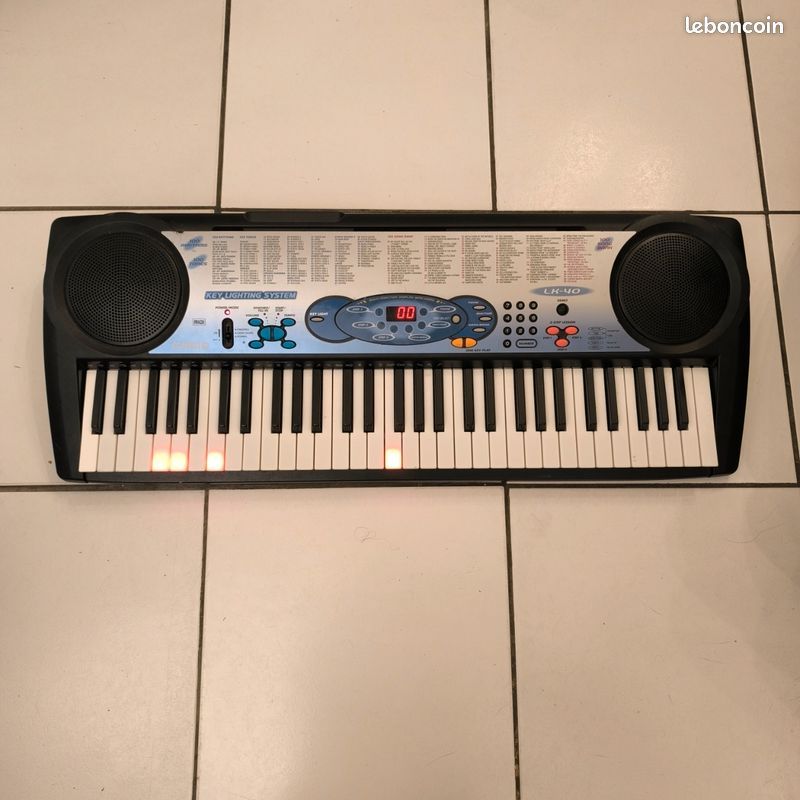Clavier synthétiseur casio lk-40 avec touches lumineuses (apprentissage)