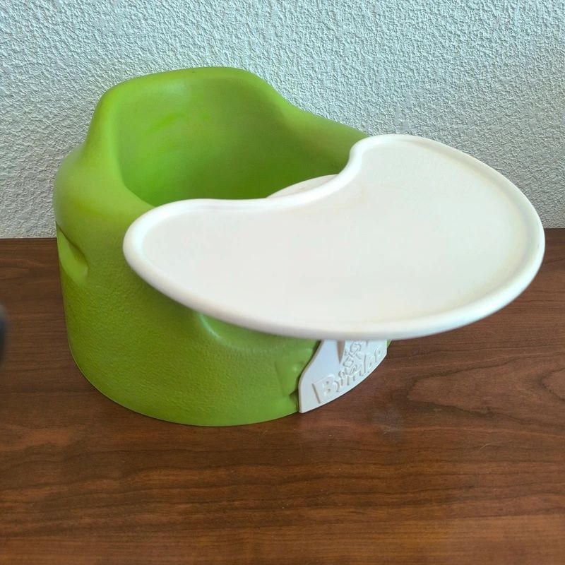 Siège Bumbo vert avec tablette