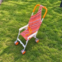 Poussette Cindico vintage années 70, modèle rétro orange rayé