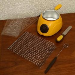 Chocolatiere pour enfant avec moules